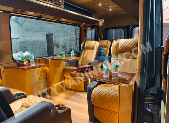 9+1 seater premium force urbania van with 1x1 massager recliner seats on rent in delhi